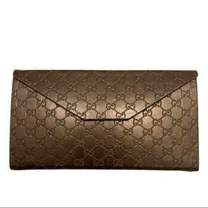 Gucci guccissima brown leather pouch case